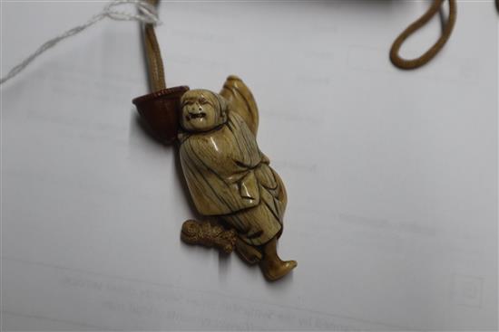 A 19th century Japanese gold lacquer five case inro, signed, together with an 18th/19th century ivory netsuke and a ojime